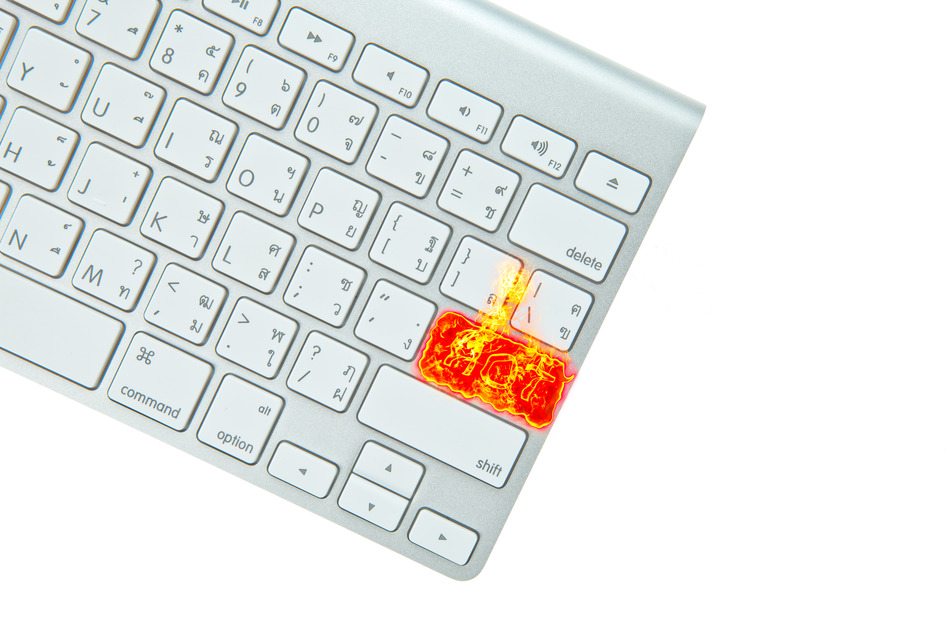 Fire hot button on computer keyboard isolated on white background